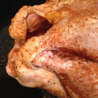 Rotisserie style chicken, baked on low in the oven. Juicy, tender, and delicious!