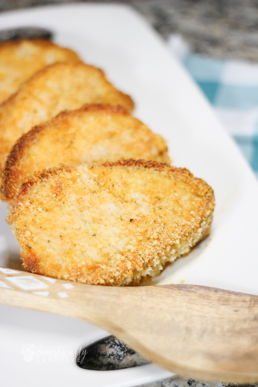 Close up of plated breaded pork chops