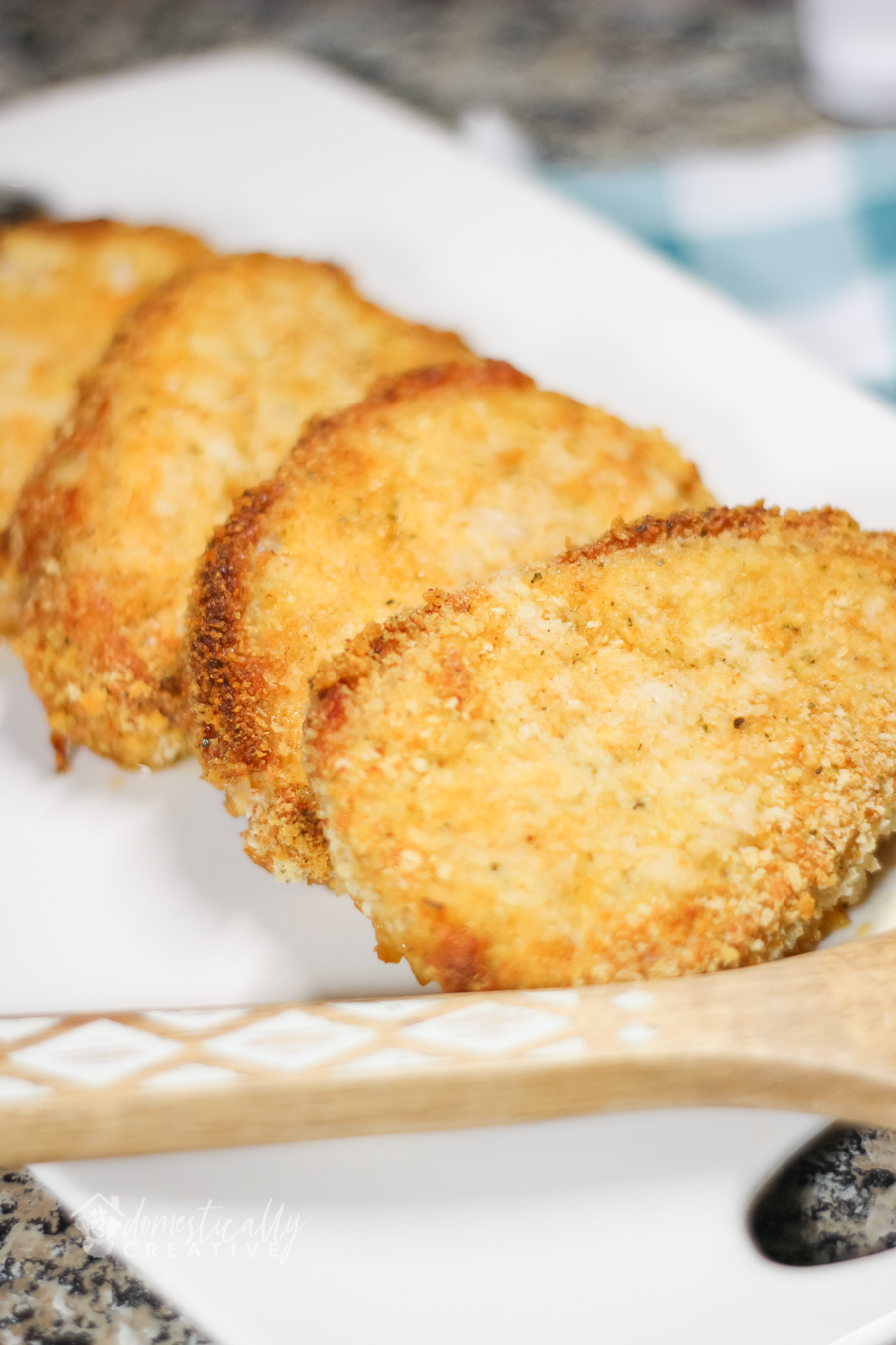 Close up of plated breaded pork chops