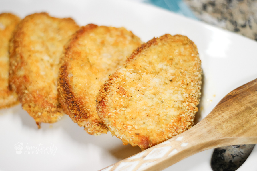 Close up of plated breaded pork chops