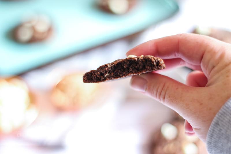 inside of a chocolate white chip toffee cookie