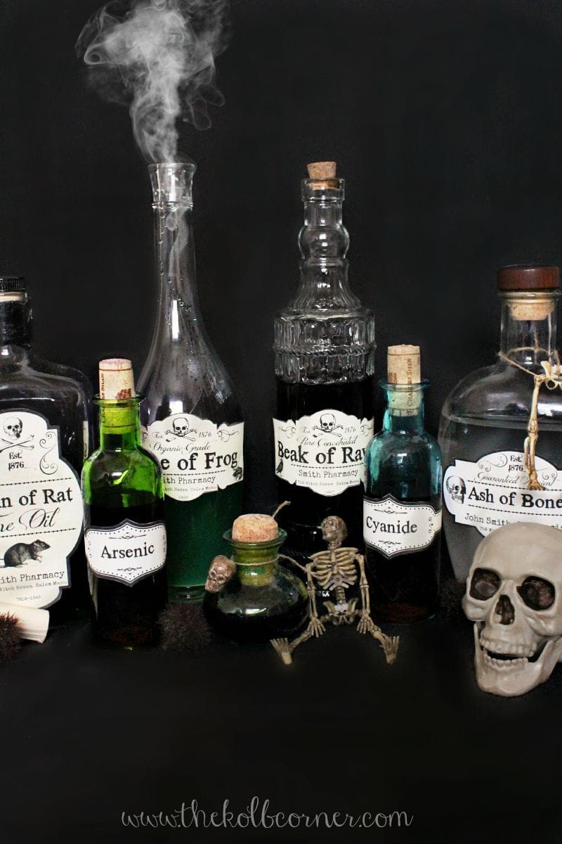 Halloween potion bottles on black background