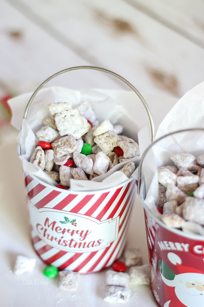 puppy chow in Christmas tins