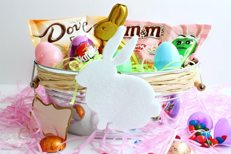 DIY Easter Basket filled with candy and Easter grass.