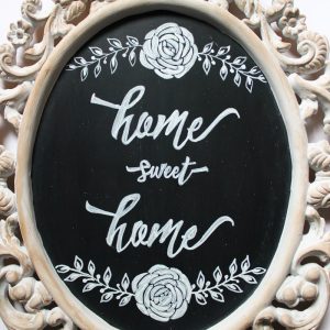 Thrifted mirror upcycled into a beautiful "Home Sweet Home" chalkboard sign.