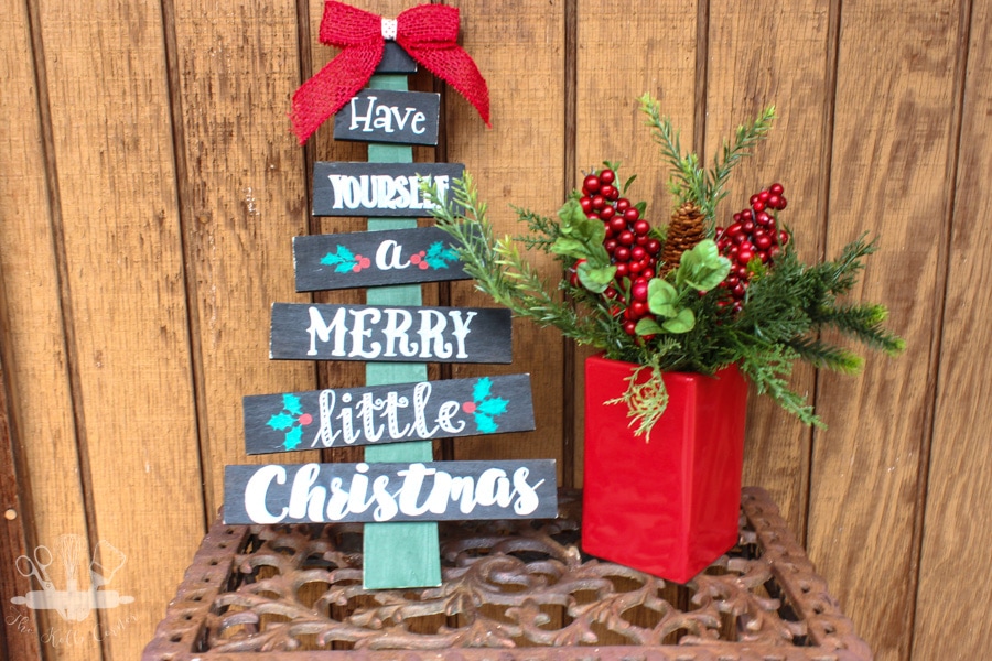 Turn a bare wood Christmas Tree from Hobby Lobby into a custom painted Christmas Tree Sign for your front porch this season!