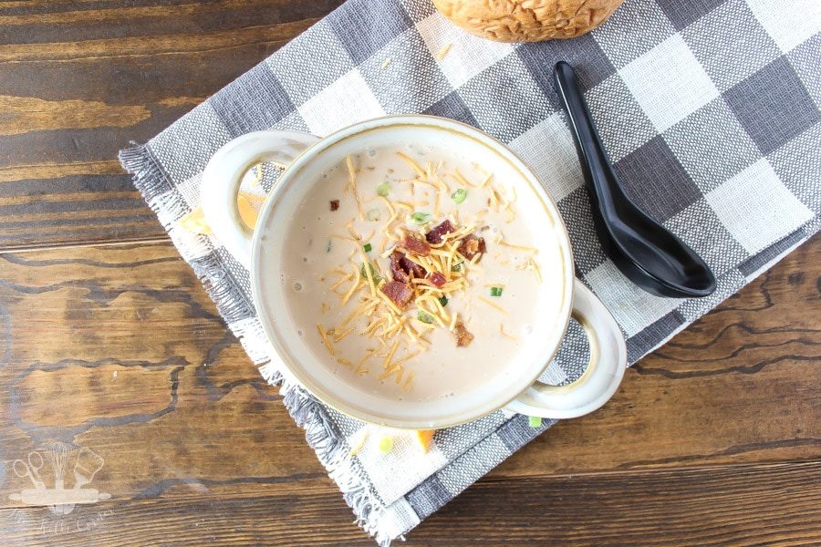 Slow Cooker Cheddar Beer Soup overhead on wood table