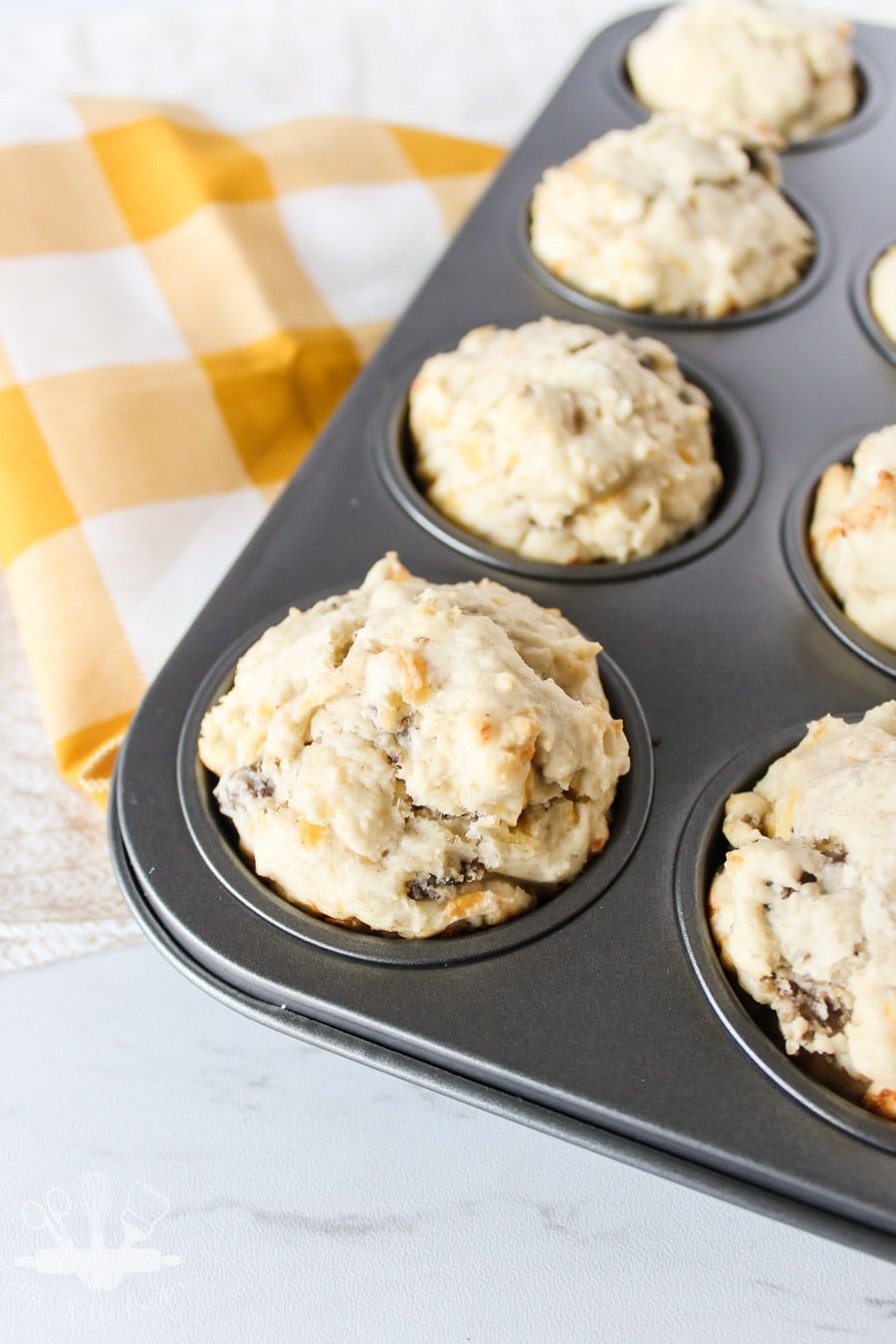 Savory Sausage and Cheese Breakfast Muffins in pan close up