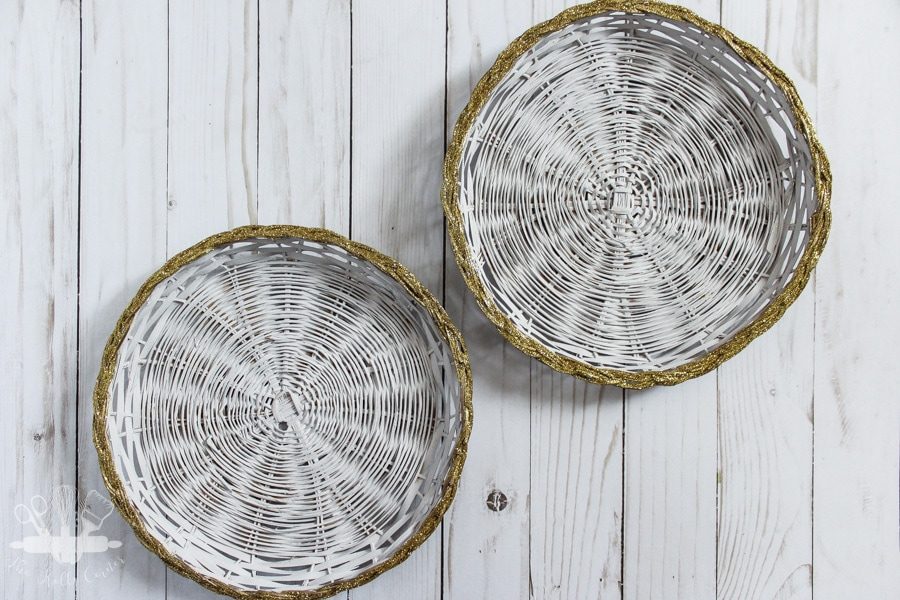 White painted wicker chargers with gold glitter edges