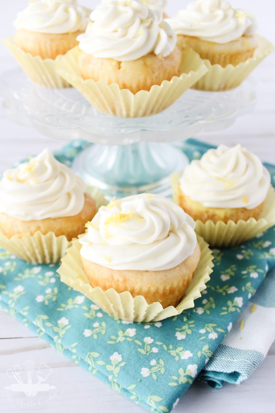 Lemon Poke Cupcakes with Lemon Cream Cheese Frosting