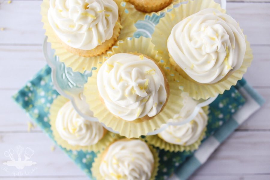 Lemon pudding poke cupcakes with lemon cream cheese frosting