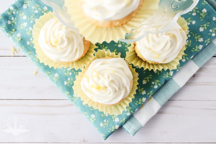 Lemon pudding poke cupcakes with lemon cream cheese frosting