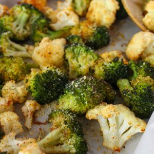 Easy and delicious oven roasted broccoli and cauliflower. A simple vegetable pairing for your next dinner.