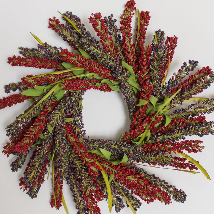 Make this simple and rustic Fall berry wreath for your front door, or just as a wall accent for the season. The colors work with any decor!