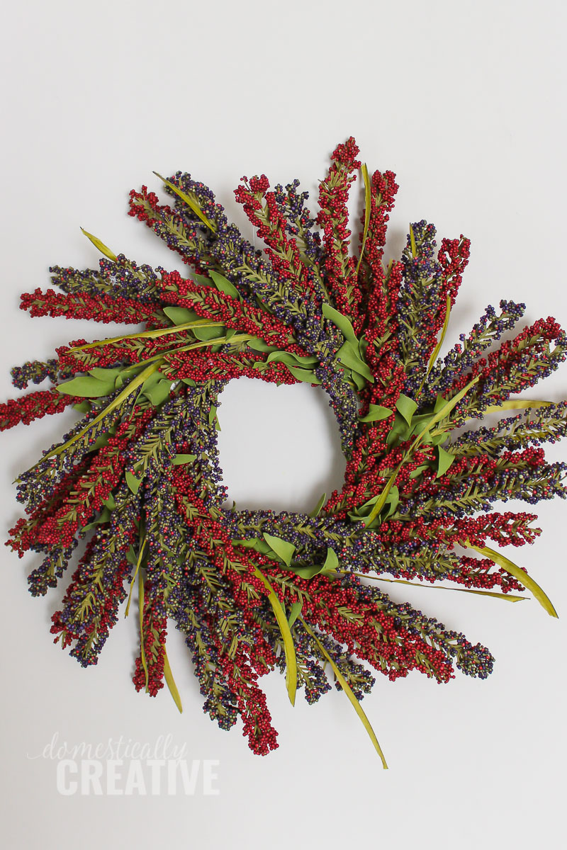Make this simple and rustic Fall berry wreath for your front door, or just as a wall accent for the season. The colors work with any decor!