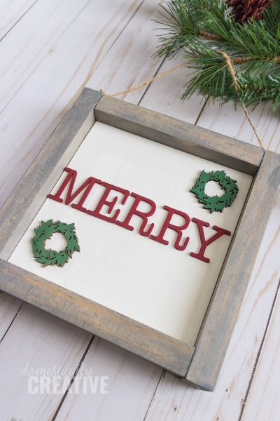 A wood framed sign in a MINI version. Perfect for a Christmas tree ornament. #christmasornament #christmastree #woodframedsign #signornament