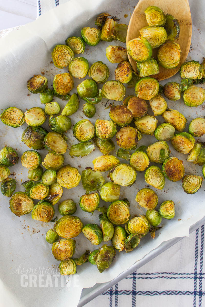 This super quick and easy oven roasted Brussels sprouts recipe is a simple and delicious side dish pairing to any entree and will quickly become your new go to recipe.