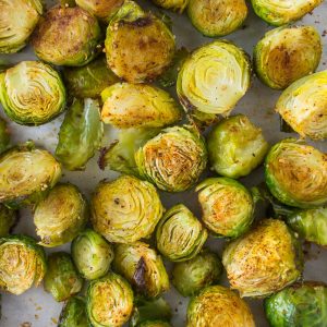 This super quick and easy oven roasted Brussels sprouts recipe is a simple and delicious side dish pairing to any entree and will quickly become your new go to recipe.