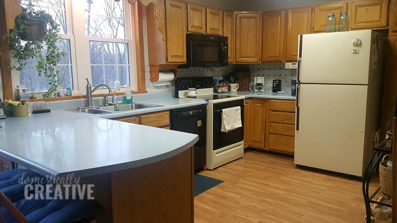 kitchen before with blue counters