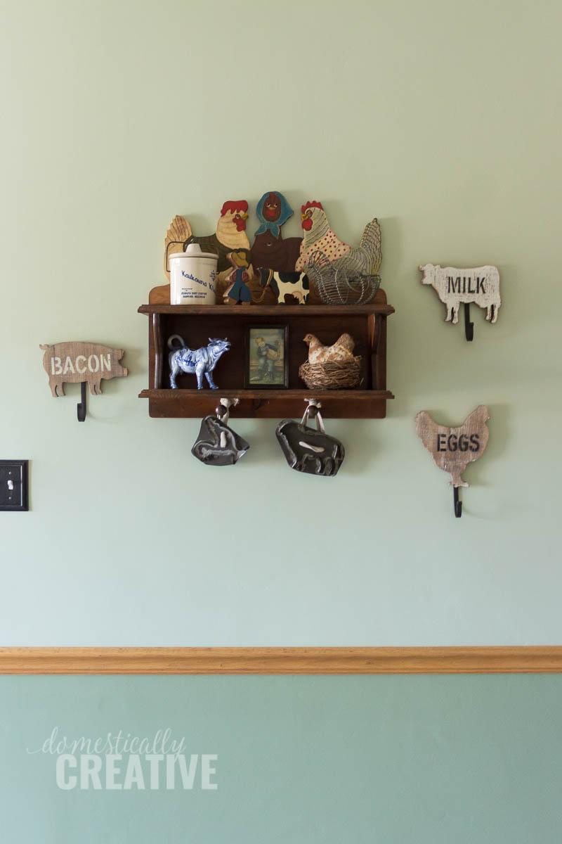 vintage rooster shelf, metal cookie cutters and farmhouse style hooks