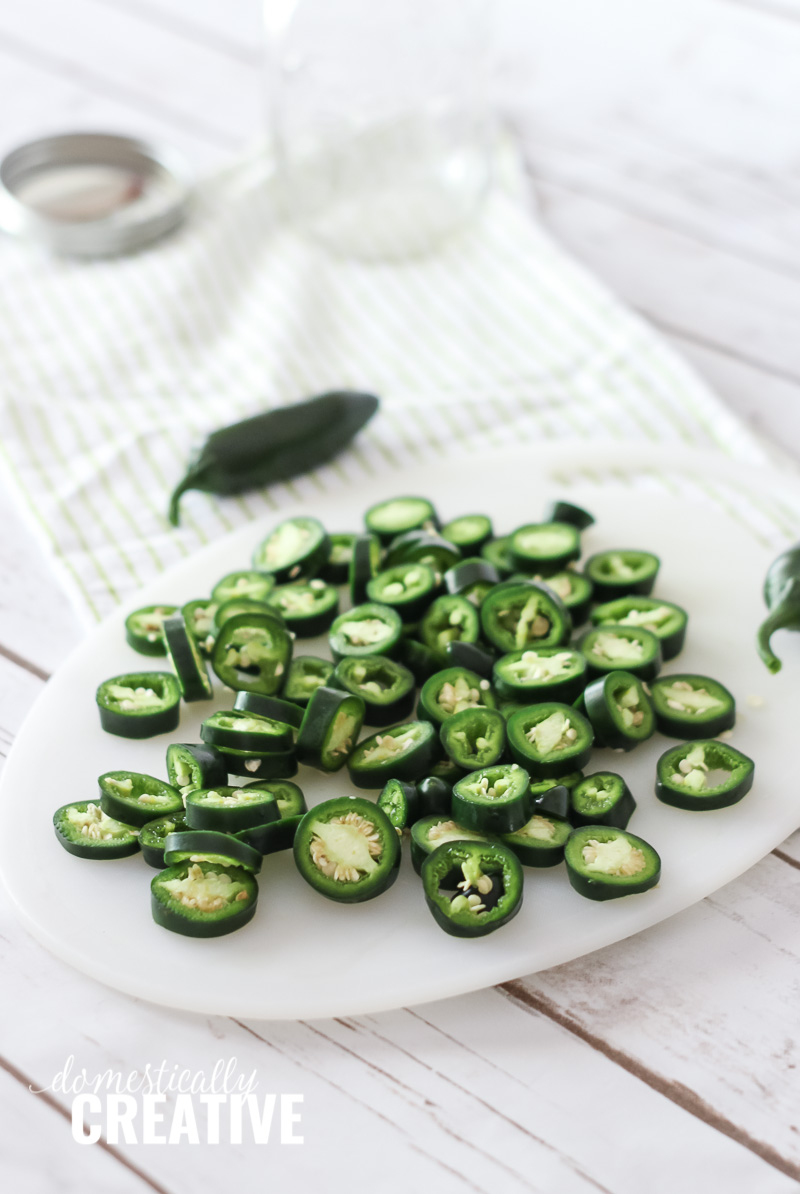 jalapeno slices on a cutting board