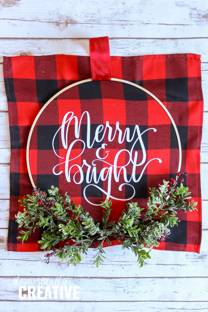 merry and bright wreath assembly in the emboidery hoop