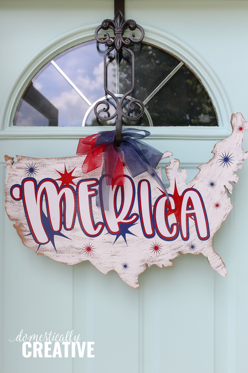 'Merica wreath on the front door, patriotic porch