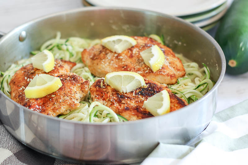 flavorful lemon and garlic chicken over zoodles