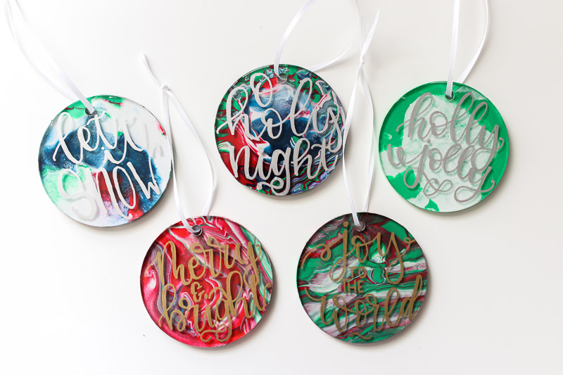 Overhead hand lettered marbled ornaments