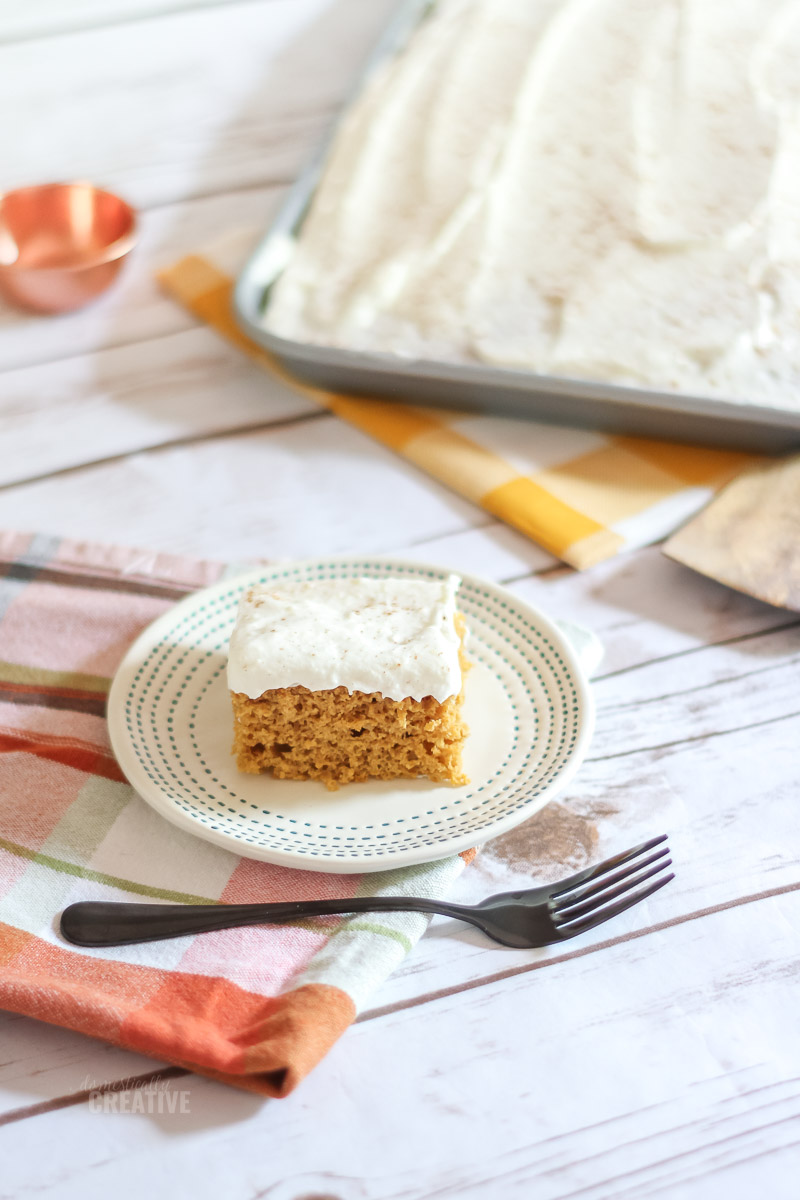 Pumpkin bar on cake plate with fork