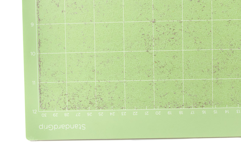 Standard grip mat green showing leftover leather remnants